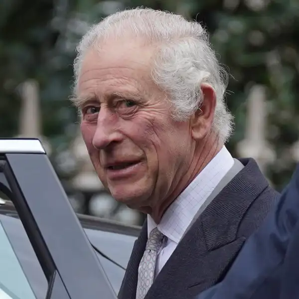 King Charles III getting into a car