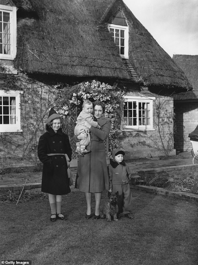 Rain (left) photographed with his mother Barbara Cartland and two brothers Ian (right) and Glenn (center) in 1940.