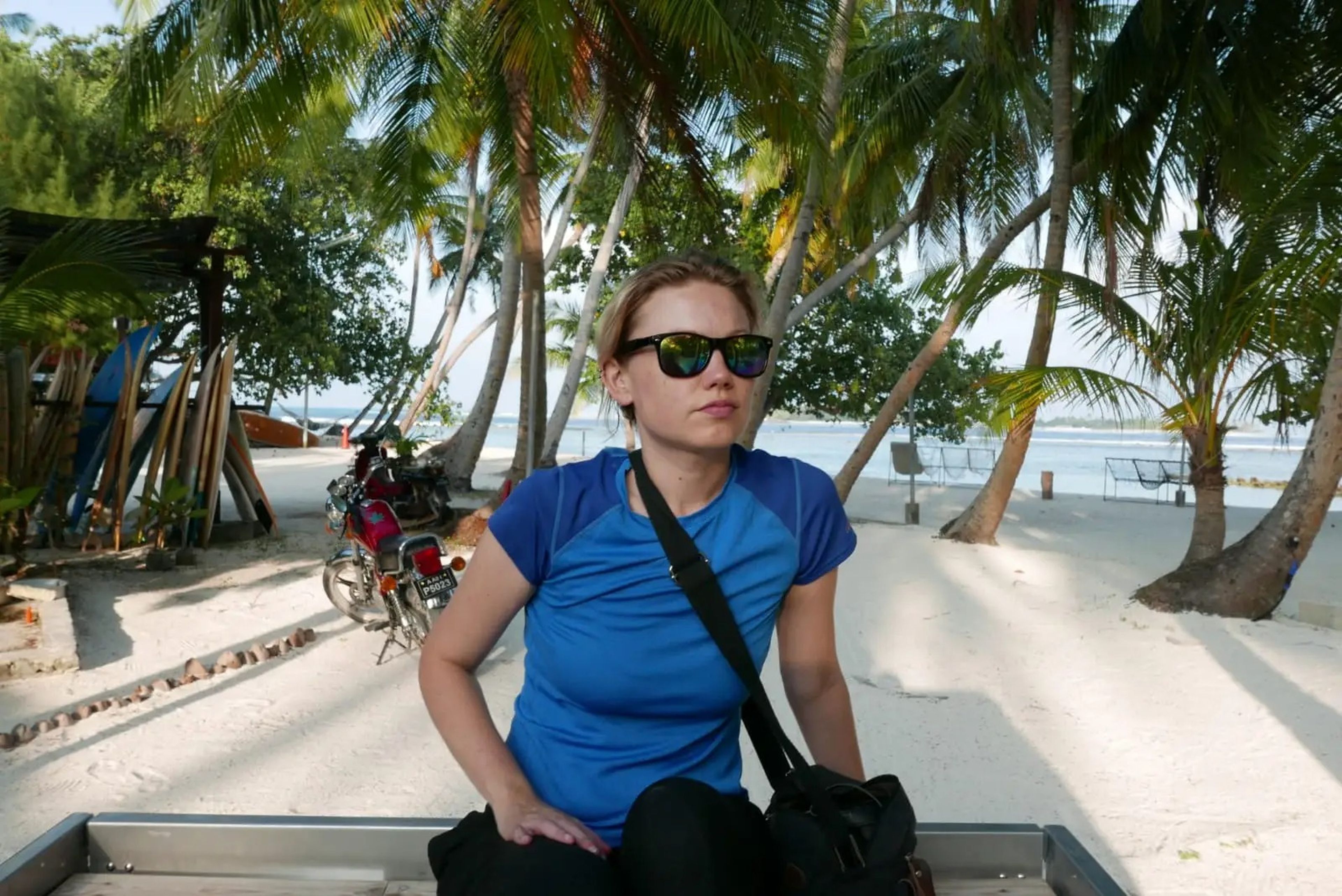 Jennifer Sizeland wearing a blue shirt and sunglasses.